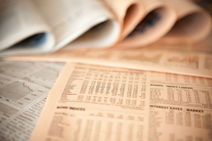 Stock quotes in the newspaper. Stock quotes in the newspaper.