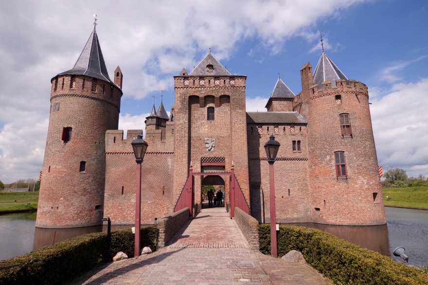A castle with a moat. A castle with a moat.