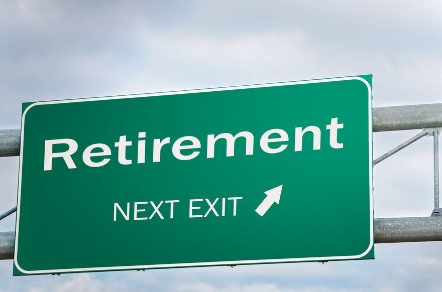 A highway sign says retirement next exit. A highway sign says retirement next exit.