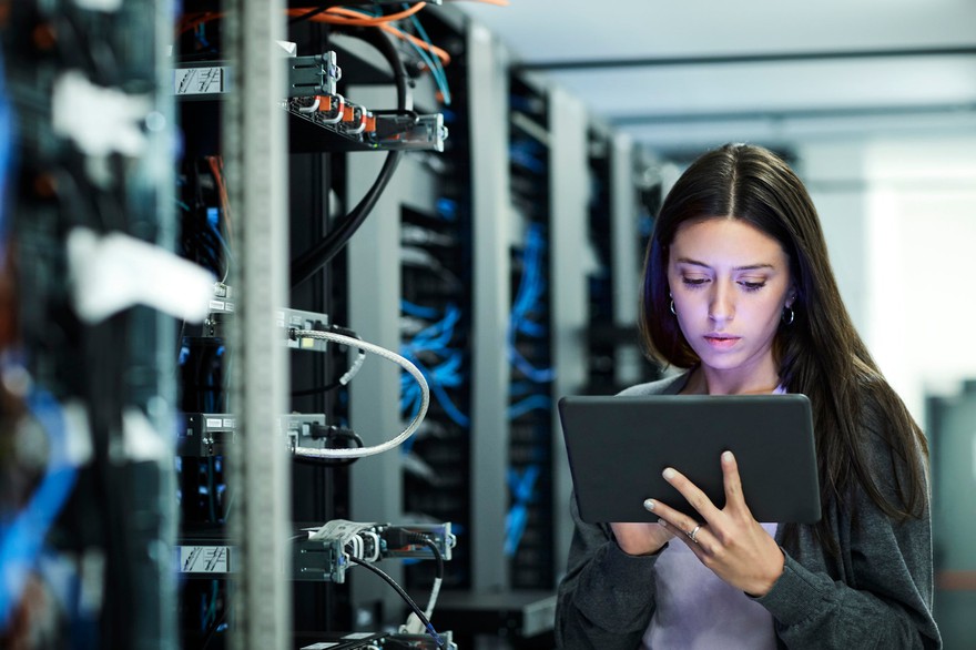 A woman using a tablet. A woman using a tablet.