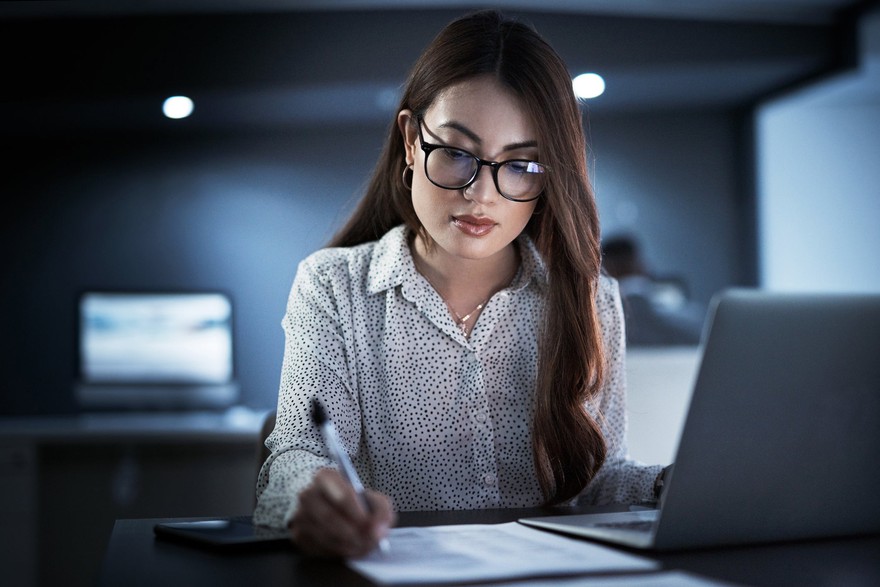 Woman working on her taxes.