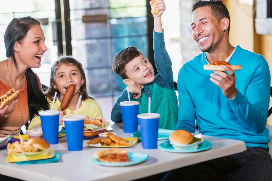 family enjoys fast food meal together family enjoys fast food meal together