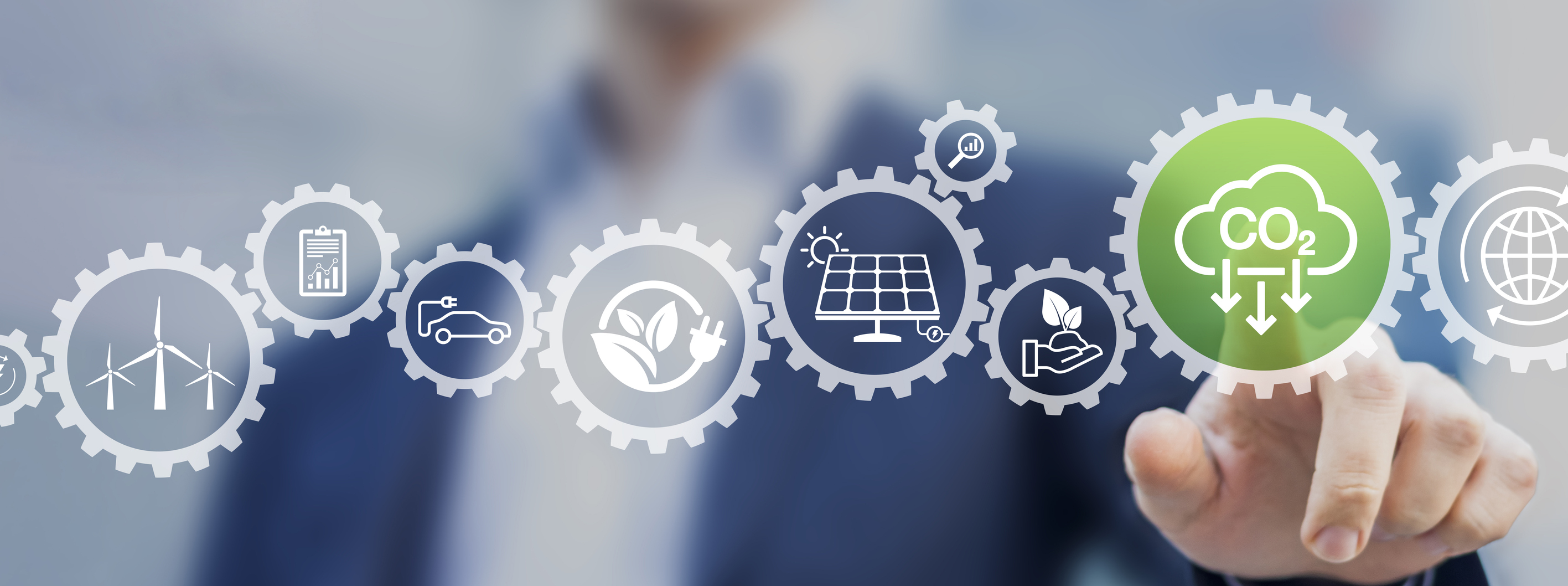 renewable energy icons Several renewable-energy-related icons with a hand pointing at one.