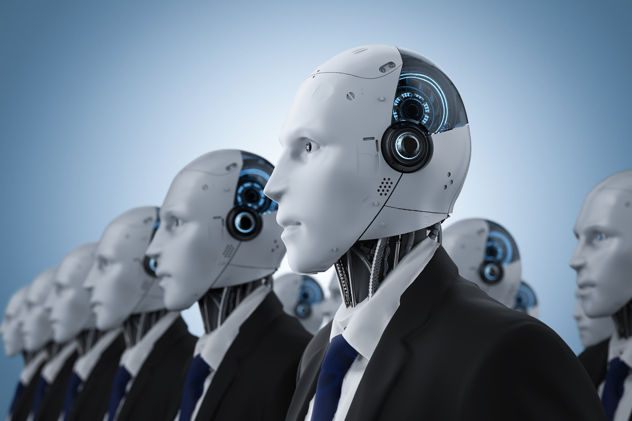 robots-androids-business-suits A gathering of robots in business suits.