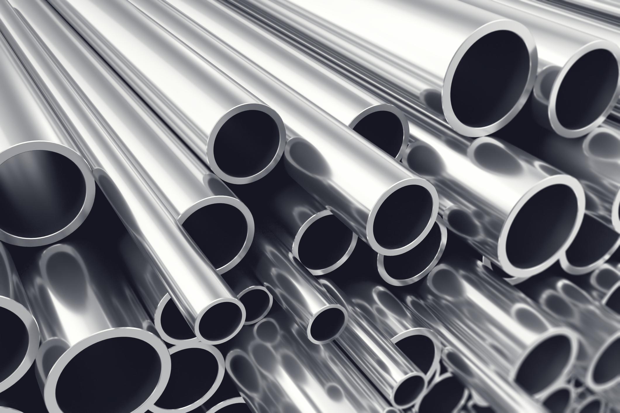 silver metal bars stacked atop one another.jpg Silver metal rods stacked atop one another
