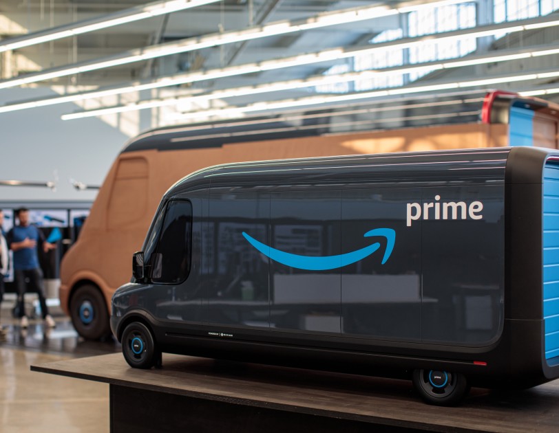 Amazon Rivian delivery vehicles. Amazon Rivian delivery vehicles.
