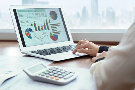 computer with charts and graphs