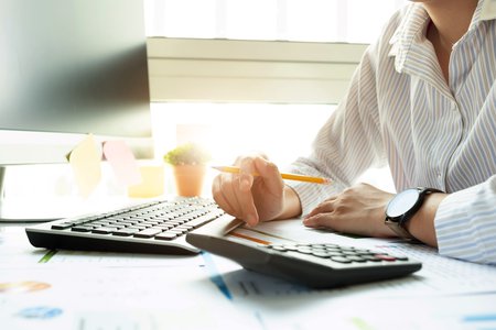person calculating bills