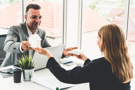 people agreeing to a loan
