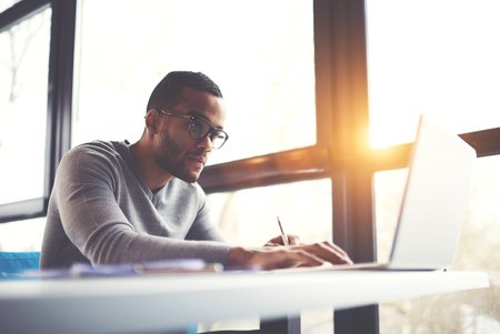 man looking at a computer