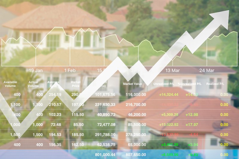 financial chart superimposed over a house