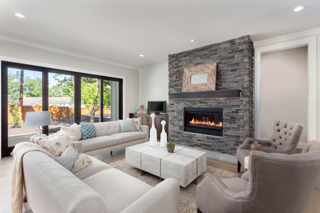 Living room interior with hardwood floors and fireplace