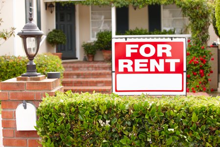 For rent sign in front of a house