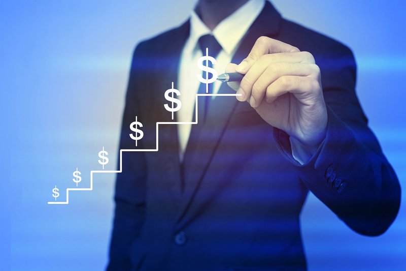 increasing Money symbol on a step ladder with man behind
