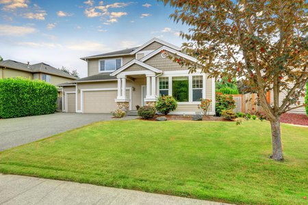 House with a green lawn