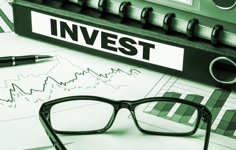 glasses with the word invest