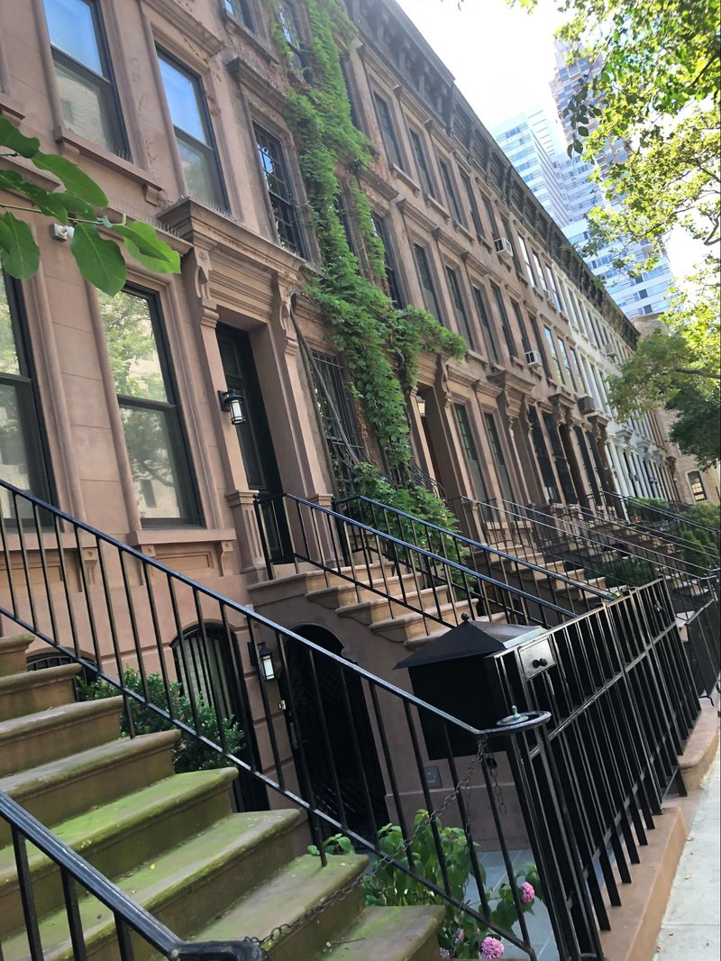 front steps in a city neighborhood