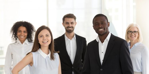 Business people standing in a group